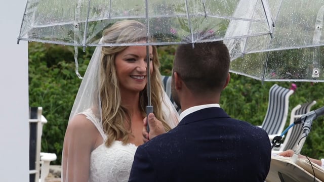 Chatham Bars Inn Couple Rainy Wedding Ceremony under clear umbrella
