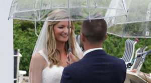 Chatham Bars Inn Couple Rainy Wedding Ceremony under clear umbrella