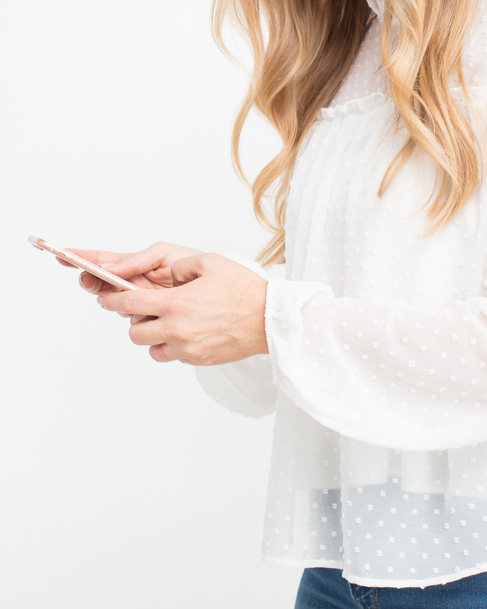 Bride looking at phone